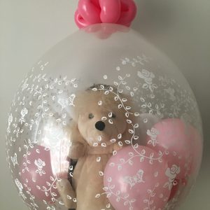 soft toy in the balloons